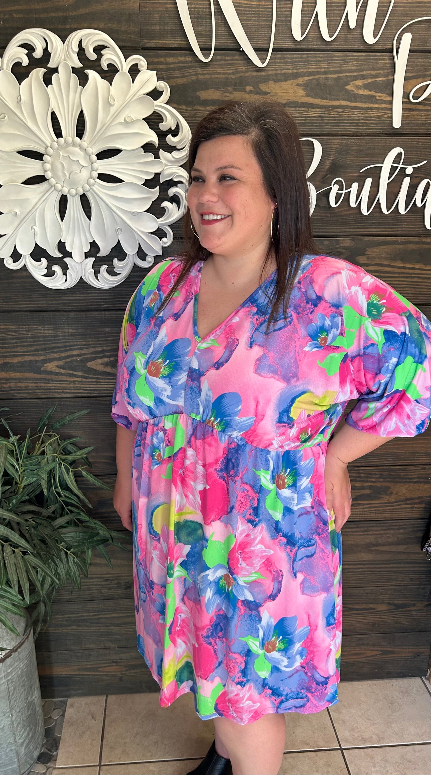 Colorful Tropical look dress, lightweight, flowy, 3/4 length sleeve, v neck in front and back, knee length, ties in back at neck.