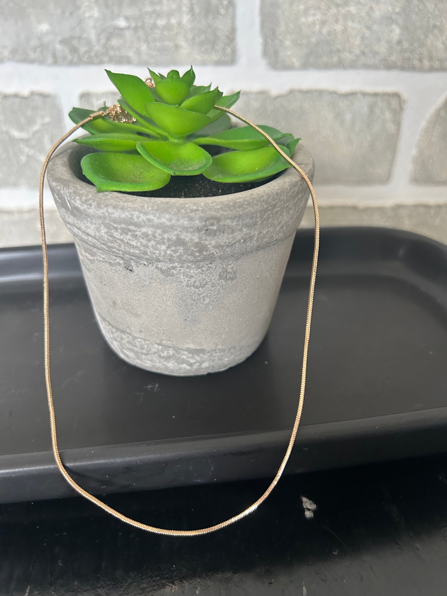 Simple Snake Chain! Its fluid movement adds a touch of elegance to any outfit. Versatile for wearing alone, layering, or adding your favorite charm or pendant from, this classic chain is a very versatile and consistently in style.
approximately 13" L + 3" extender