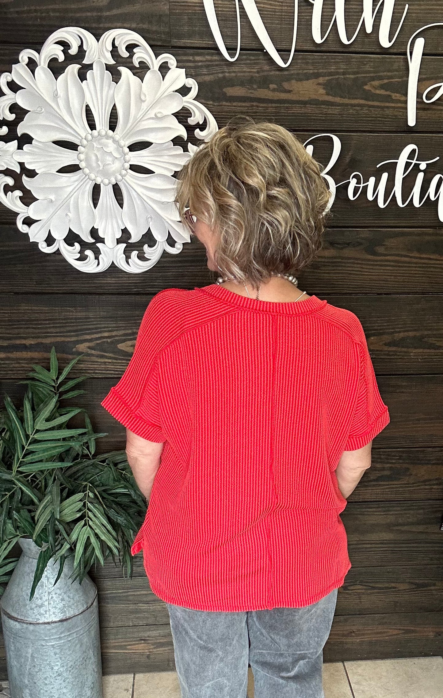 corded, ,hi/low v neck, stretchy top, short sleeves with cuff. Relaxed fit