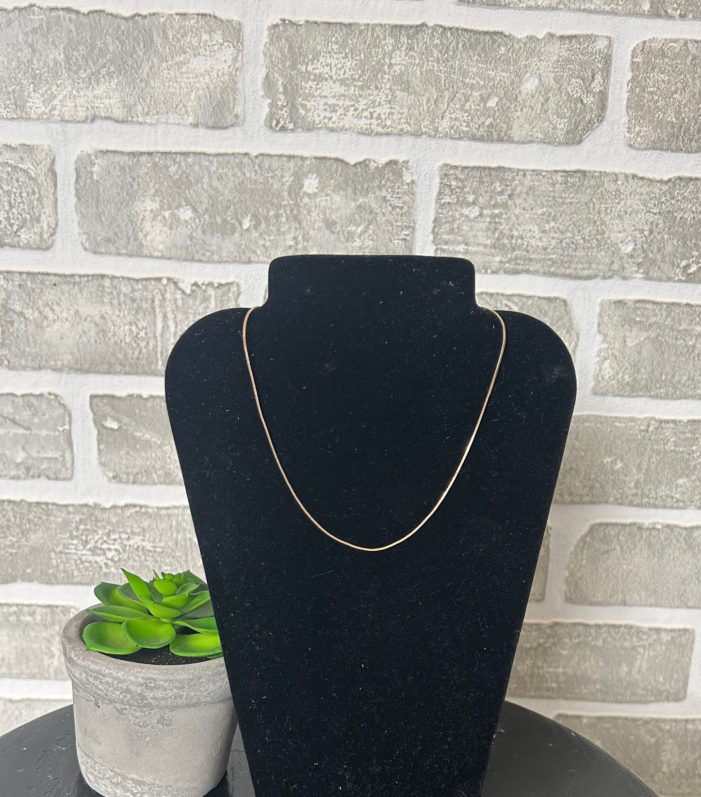 Simple Snake Chain! Its fluid movement adds a touch of elegance to any outfit. Versatile for wearing alone, layering, or adding your favorite charm or pendant from, this classic chain is a very versatile and consistently in style.
approximately 13" L + 3" extender