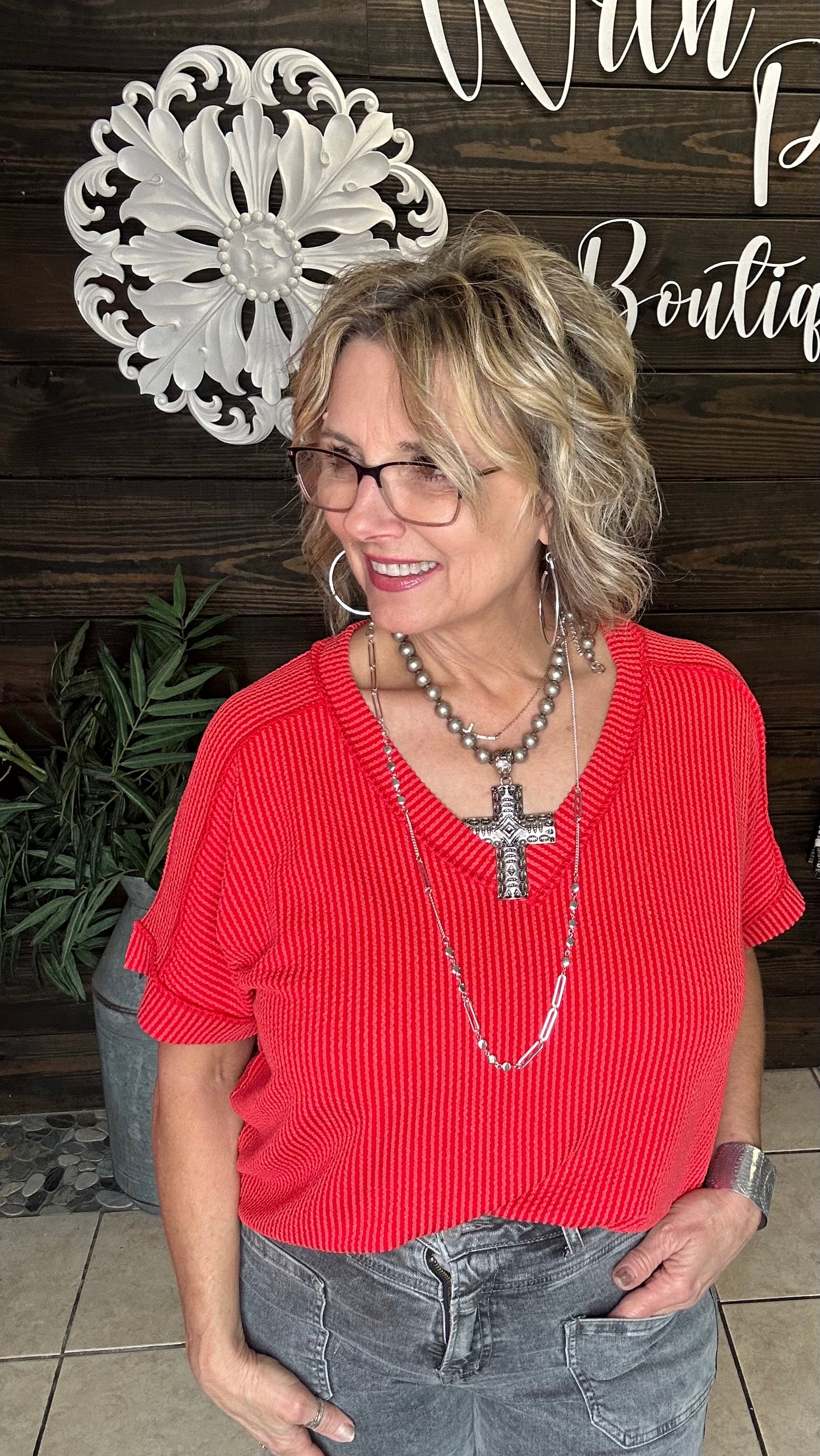 corded, ,hi/low v neck, stretchy top, short sleeves with cuff. Relaxed fit