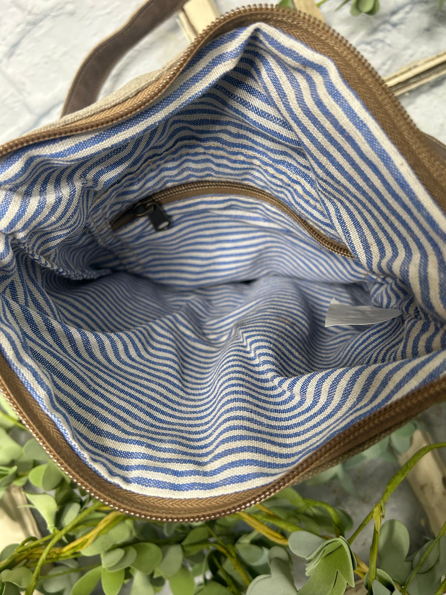 Elevate your accessory game with our TREE OF LIFE CROSSBODY BAG. This stunning bag features an eye-catching tree of life graphic that symbolizes connection and growth. Thoughtfully crafted from upcycled tent canvas, it combines sustainability with durability. The perfect blend of style and eco-consciousness, this versatile crossbody is the essential addition your wardrobe demands.
9.5" x 12"