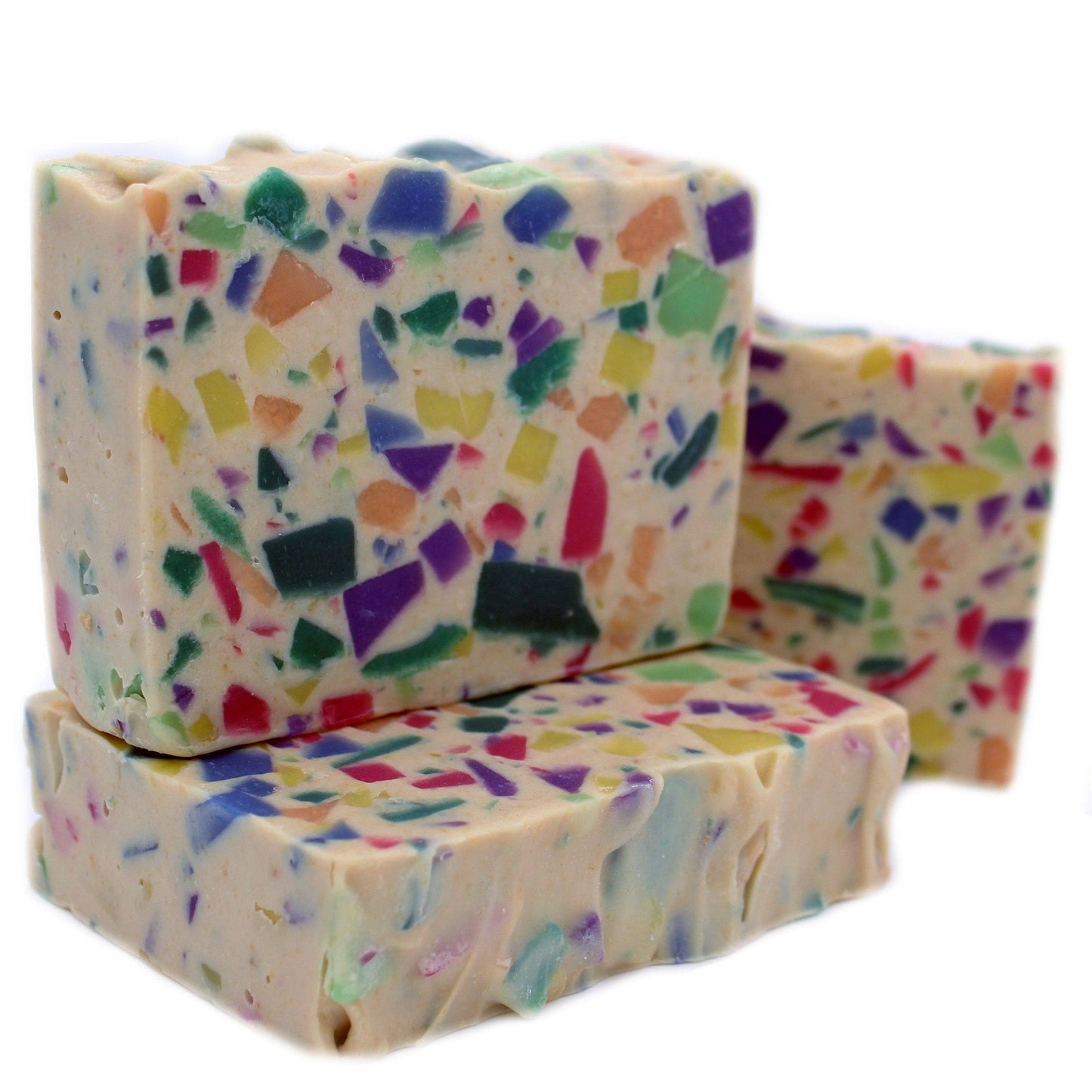 Colorful terrazzo-patterned soap bars on a white background