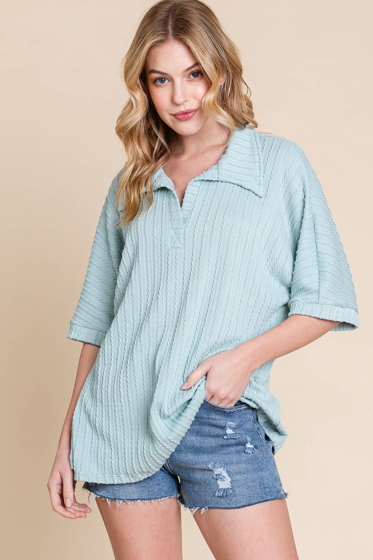 This cable knit polo style is nice and soft and comfortable but also stylish. The added texture detail plus the collar and short sleeves add a modern twist and make this piece easy to pair with all of your favorite bottoms. Great transitional piece too!
Fits relaxed, most can size down 1
86% Polyester/33%Rayon1% Spandex/ MADE IN USA