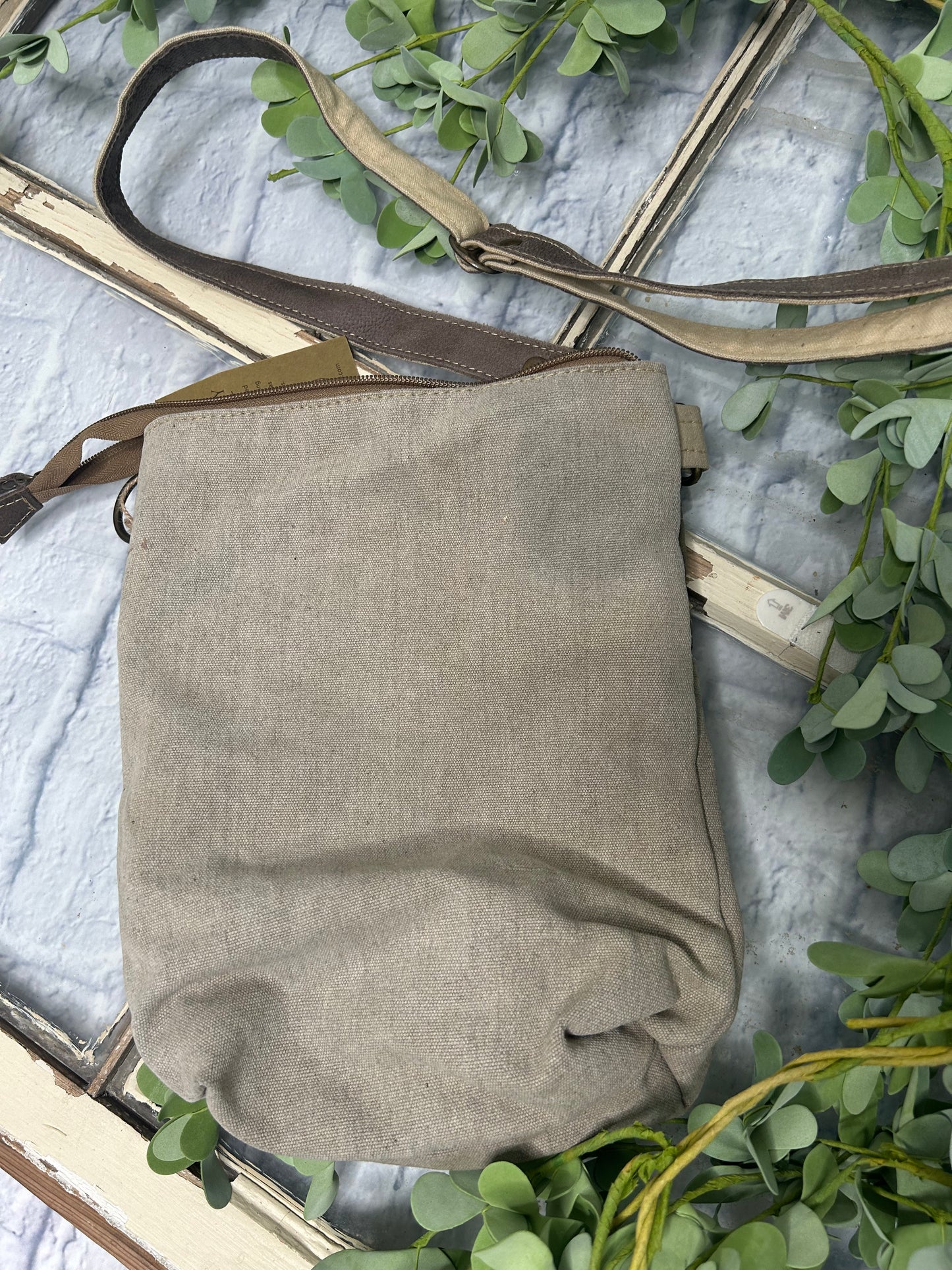 Elevate your accessory game with our TREE OF LIFE CROSSBODY BAG. This stunning bag features an eye-catching tree of life graphic that symbolizes connection and growth. Thoughtfully crafted from upcycled tent canvas, it combines sustainability with durability. The perfect blend of style and eco-consciousness, this versatile crossbody is the essential addition your wardrobe demands.
9.5" x 12"