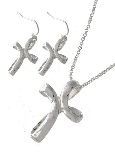 A cross necklace with matching cross earrings shown on a white background