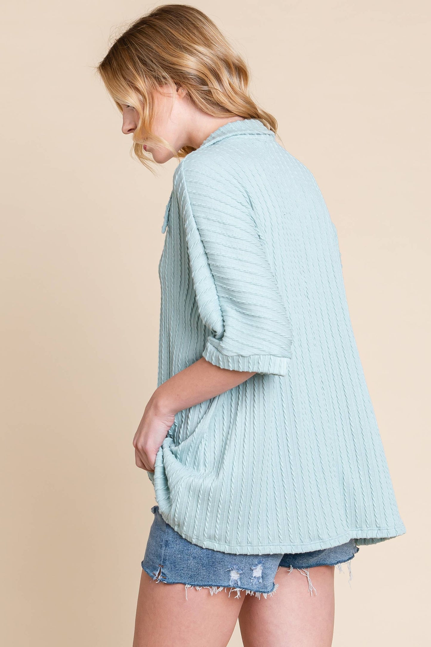 This cable knit polo style is nice and soft and comfortable but also stylish. The added texture detail plus the collar and short sleeves add a modern twist and make this piece easy to pair with all of your favorite bottoms. Great transitional piece too!
Fits relaxed, most can size down 1
86% Polyester/33%Rayon1% Spandex/ MADE IN USA