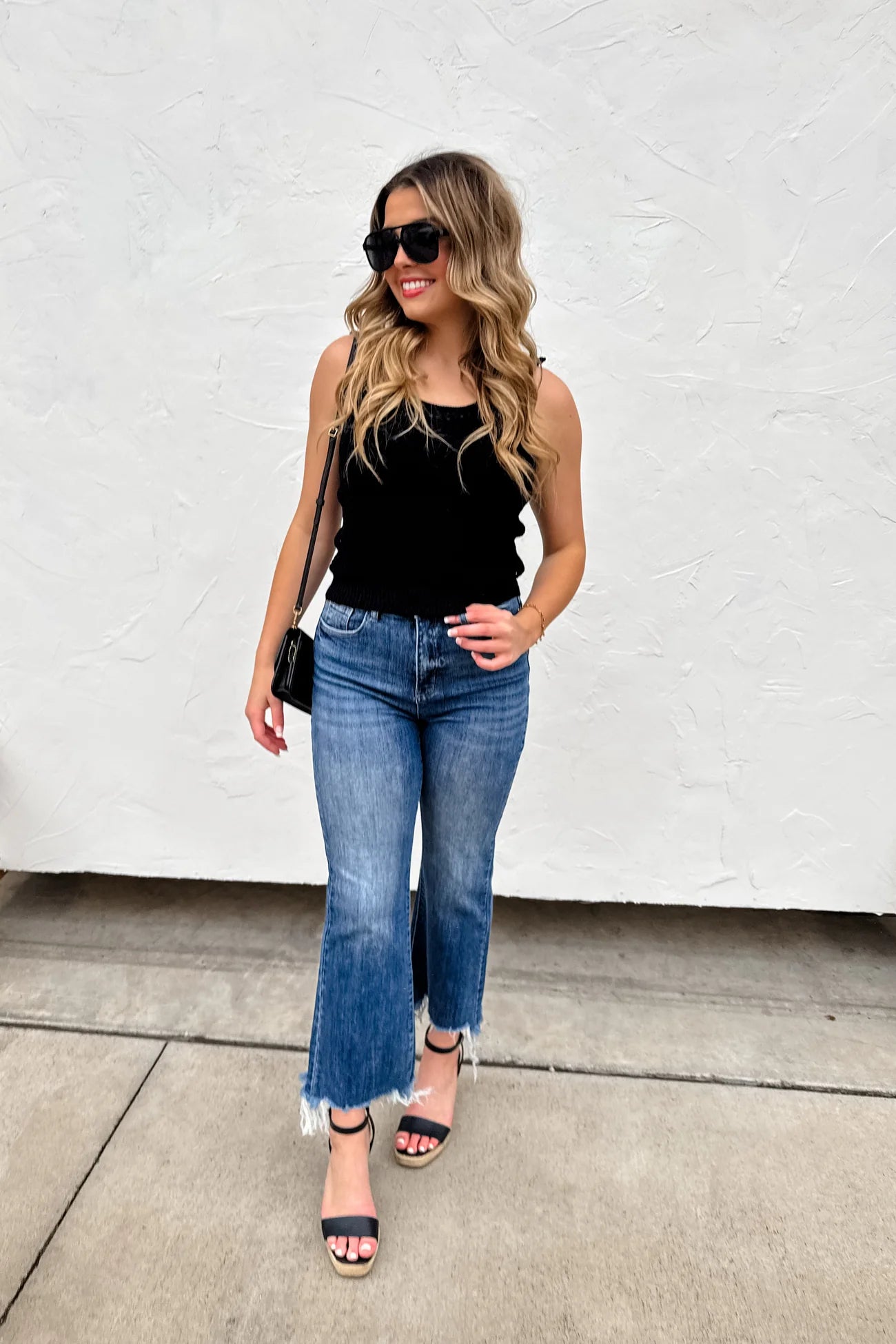 One of our all-time best selling jeans now come in a&nbsp;NON&nbsp;distressed style!&nbsp; So many of you have requested this same style with no knee distressing...so voila!&nbsp; These jeans feature a crop flare style, raw ankle hem, and high-rise waist.&nbsp;

FIT:&nbsp; Tummy Control, very stretchy, and a high-rise waist; recommended sizing down for the best fit.

FABRIC: 95% Cotton, 3.5% Polyester, 1.5% Spandex