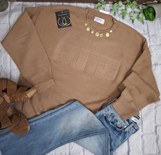 This embossed sweater doesn't just celebrate your love for coffee—it envelops you in exceptional softness and comfort while making a stylish impression. Elevate your daily wardrobe with this cozy piece that perfectly combines fashion and your passion for coffee.

61% Polyester, 39% Acrylic