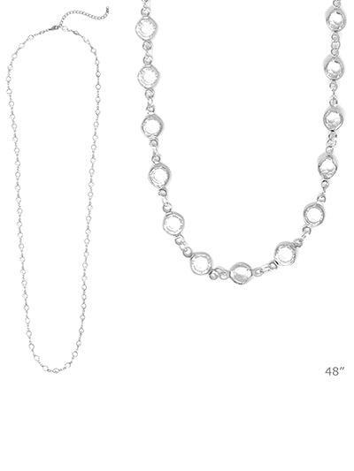 Add a sparkling touch to any outfit with our Crystal Linked Necklace! Made with high-quality crystals, this necklace is sure to catch the light and dazzle everyone around. Each crystal is carefully linked together to create a unique and stunning piece of jewelry. Elevate your look and feel confident with the Crystal Linked Necklace. 48" long
