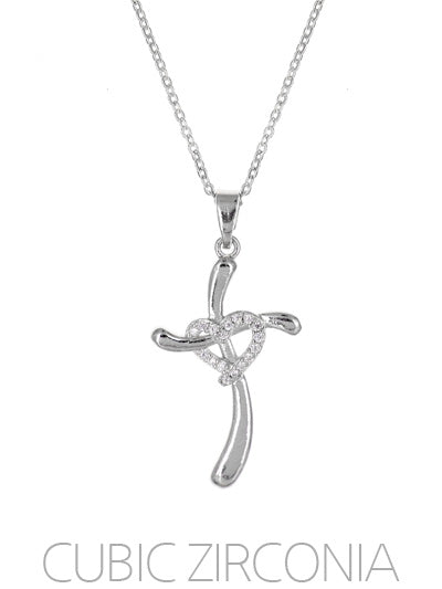 Indulge in the beauty and elegance of our unique Cross Necklace. The delicate cross pendant features a stunning pave stone heart at its center, adding a touch of subtle glamour to any outfit. Make a statement of faith and style with this beautiful necklace.

Approx. 16"L
