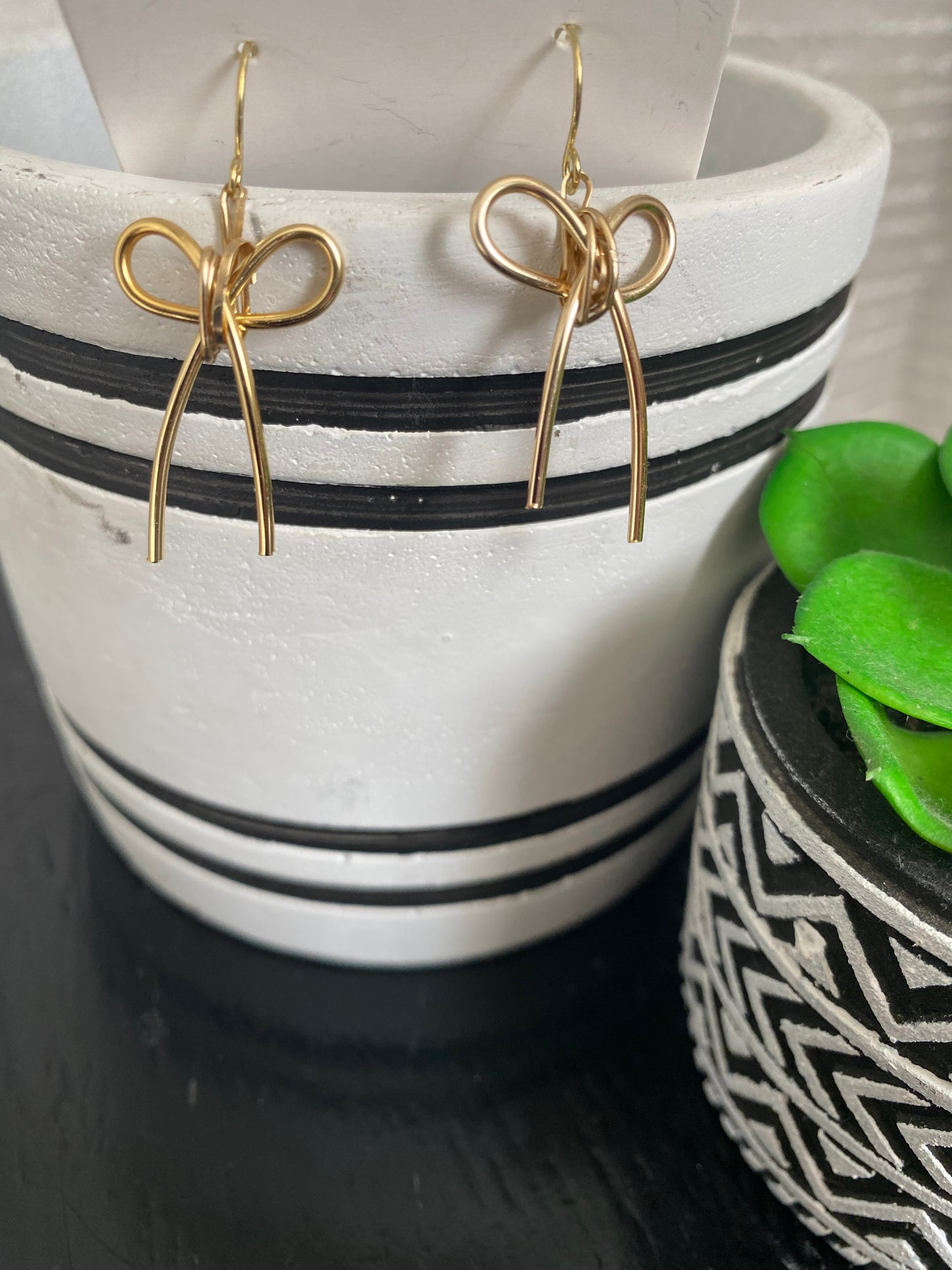 handcrafted gold bow earrings