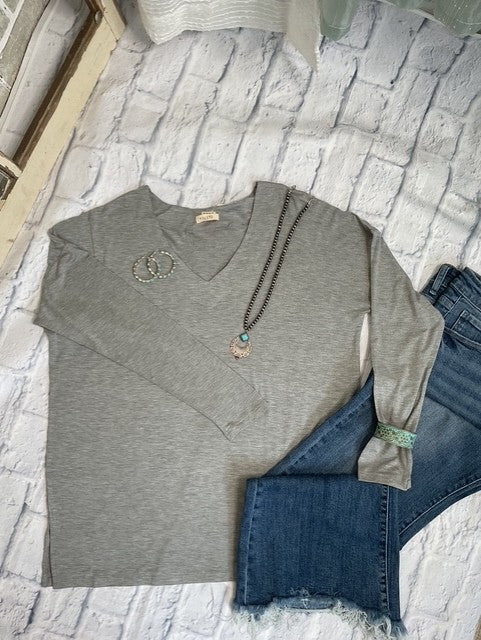 Experience cozy comfort with the Fall Favorite Long Sleeve Top! It is buttery soft and features a relaxed fit.&nbsp; This top makes layering effortless and is ideal for unpredictable fall weather. It comes in three colors designed to complement your autumn wardrobe.

96% Rayon/5% Spandex