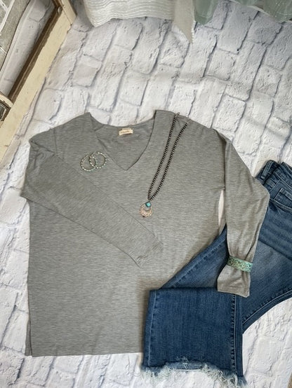 Experience cozy comfort with the Fall Favorite Long Sleeve Top! It is buttery soft and features a relaxed fit.&nbsp; This top makes layering effortless and is ideal for unpredictable fall weather. It comes in three colors designed to complement your autumn wardrobe.

96% Rayon/5% Spandex