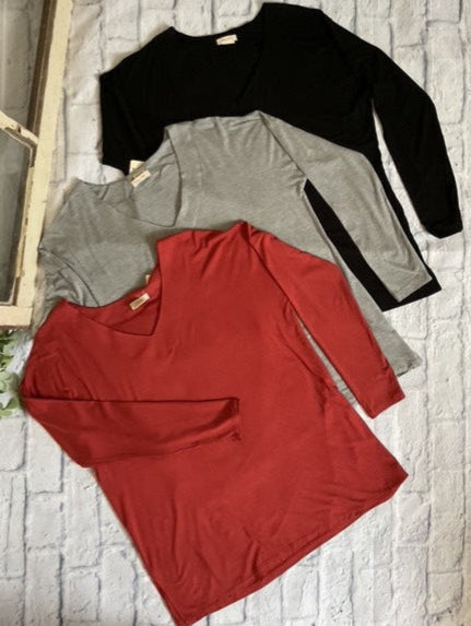 Experience cozy comfort with the Fall Favorite Long Sleeve Top! It is buttery soft and features a relaxed fit.&nbsp; This top makes layering effortless and is ideal for unpredictable fall weather. It comes in three colors designed to complement your autumn wardrobe.

96% Rayon/5% Spandex