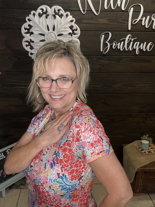 Transform any outfit with our Flowers Everywhere Top! Made with super soft fabric, this top features a beautiful floral design that adds a touch of elegance to any look. Dress it up for a special occasion or dress it down for a casual day out. Versatility meets comfort in this must-have top.

95% Polyester, 5% Elastane