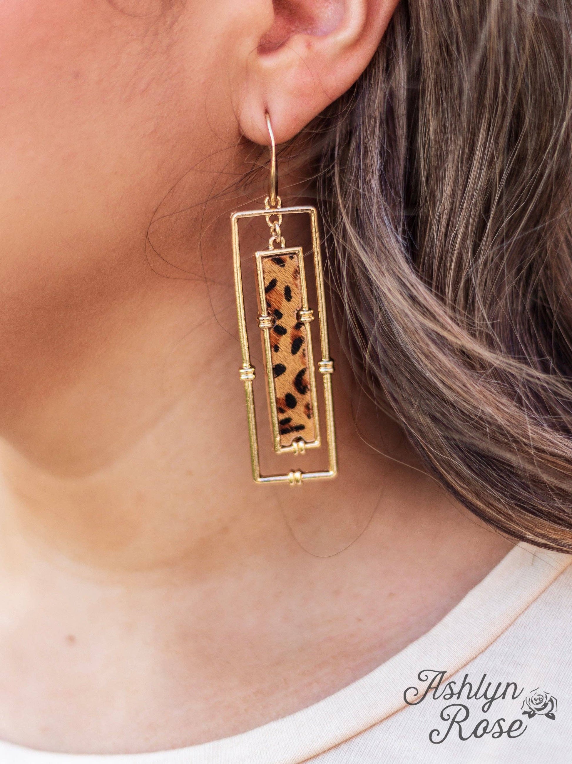 Think Outside Of The Frame Leopard And Gold Rectangular Earrings - fishhook style on a womans ear