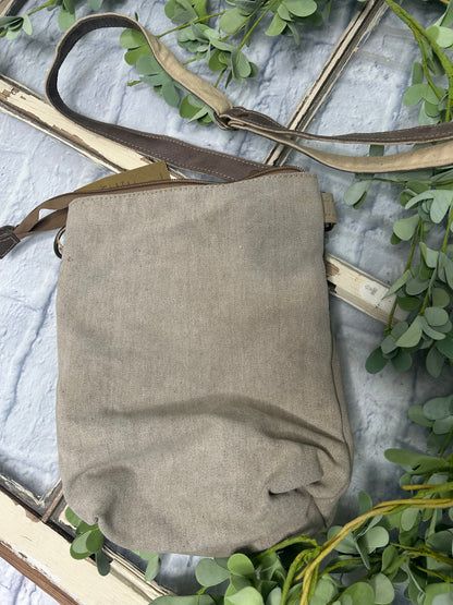 Elevate your accessory game with our TREE OF LIFE CROSSBODY BAG. This stunning bag features an eye-catching tree of life graphic that symbolizes connection and growth. Thoughtfully crafted from upcycled tent canvas, it combines sustainability with durability. The perfect blend of style and eco-consciousness, this versatile crossbody is the essential addition your wardrobe demands.

9.5" x 12"