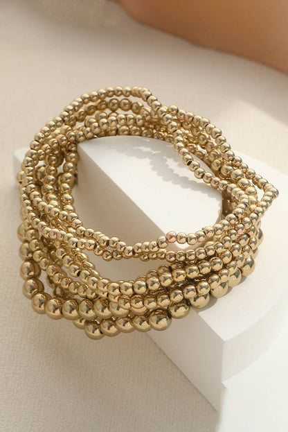 set of 7 separate stretch bracelets in varying sizes of beads