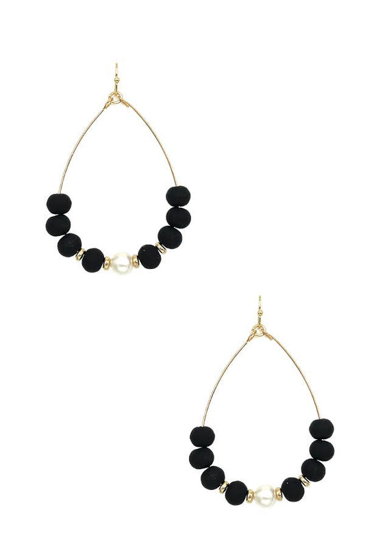 Black clay beads on a wire teardrop gold chain earring