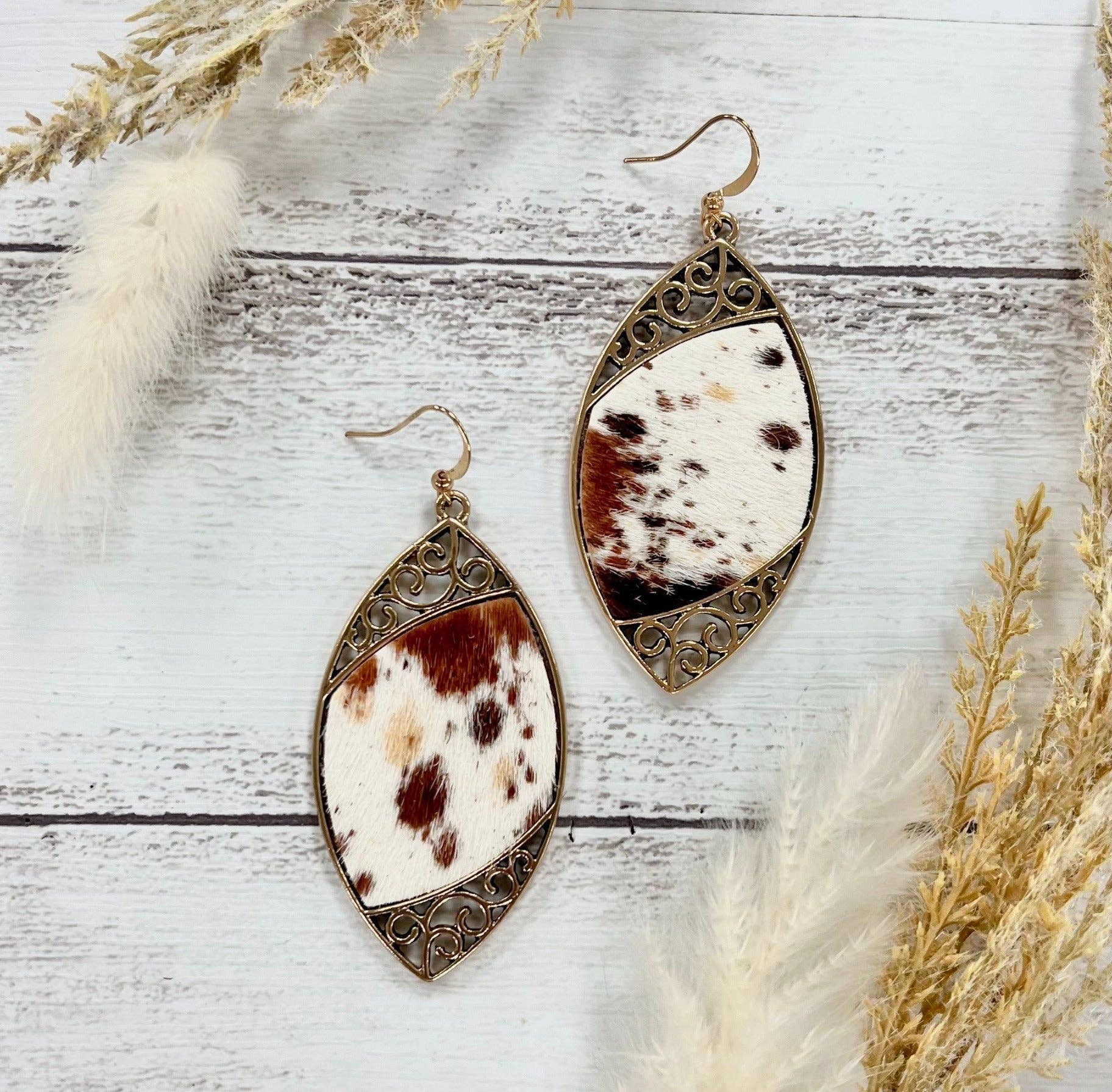 Cowhide Serenade: Gilded Gold Scroll Earrings with a Twist - With Purpose Boutique