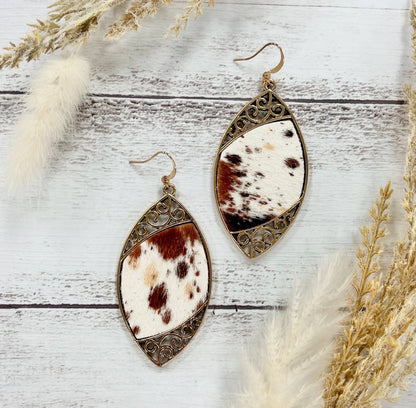Cowhide Serenade: Gilded Gold Scroll Earrings with a Twist - With Purpose Boutique