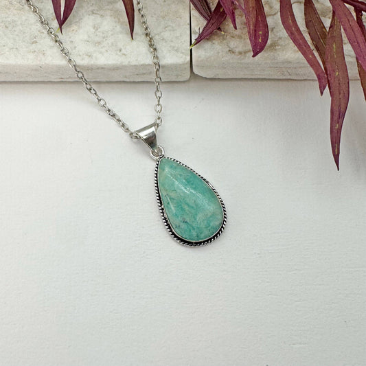Genuine semi-precious stone jewelry set in silver-plated brass. As these are natural stones the color and exact size/shape will vary. Pendant is on a 16" chain with 2" extender.