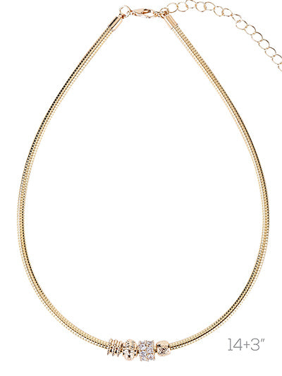 Gold necklace with a small diamond pendant on a white background